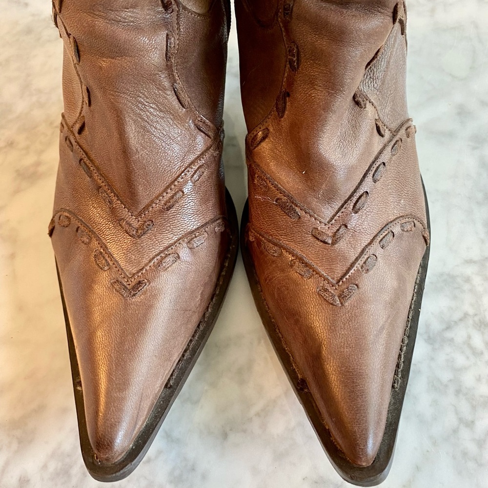 Stunning brown boots with cowboy-esque detailing